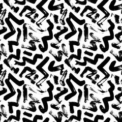 Seamless zig zag vector pattern. Abstract monochrome geometric brush strokes. Black and white hand painted ink illustration. Freehand zigzag brush strokes. Simple monochrome geometric ornament