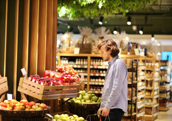 Man buying fruits and vegetables  at the market