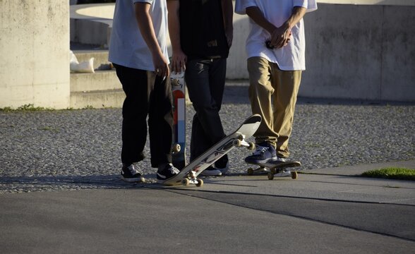 group of skateboarders in a skatepark