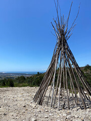 The Patio das Cabanas (Huts Courtyard) in Vila Cha, Esposende, Portugal. Wooden stick hut house,...