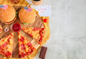 Burgers and pizza set in stone.