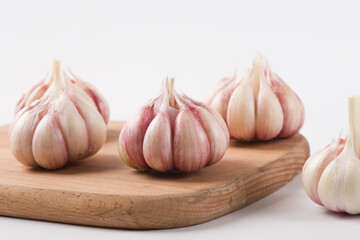 Garlic Cloves and Garlic Bulb on white background