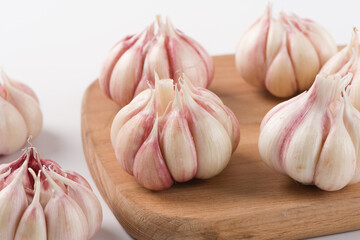 Garlic Cloves and Garlic Bulb on white background