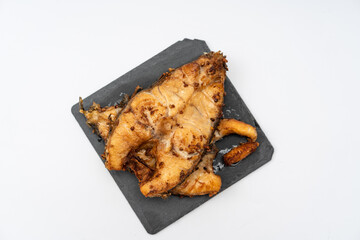 Fried mackerel on a white background