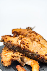Fried mackerel on a white background