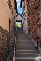 stairs between old buildings in black forest village