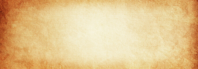 Old vintage brown paper banner background with faded frayed center