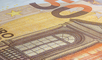 Macro close up on the design surface of 50 euro notes. Banknotes of the European Union. Wallpaper background of money. Detailed currency closeup. Euros isolated flat capture, New Fifty Euro Note