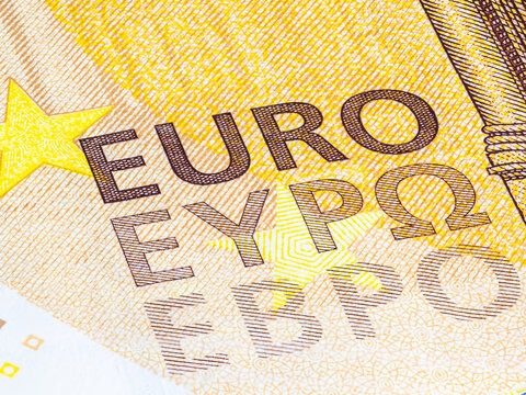 Macro photography of the intaglio print on a fifty euro banknote, high resolution capture. Sharp detailed shot of the euro character on the ecb 50 euros notes. Currency of Europe 