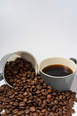 Coffee beans and coffee on a white background