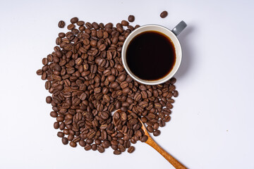 Coffee beans and coffee on a white background