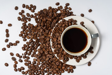Coffee beans and coffee on a white background