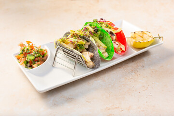 A view of a plate of fish tacos.