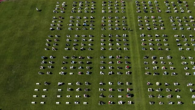 Aerial View Of People Attending Commencement Ceremony With Social Distancing During Pandemic In Tacoma, Washington, USA.