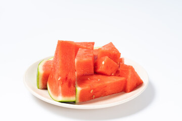 The sliced watermelon is on the plate