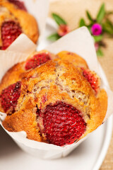 Homemade baked muffins with delicious fresh strawberries