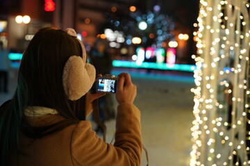 person in the street at night