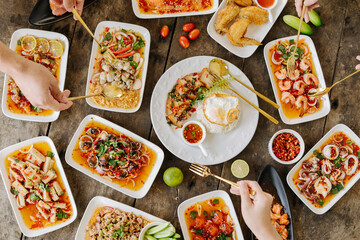 Top view Thai food, spicy food, decorate a variety of dishes. Restaurant menu decoration pictures