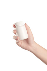 Hand holding white plastic medicine bottle isolated on white background.