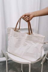 hand holding a basket