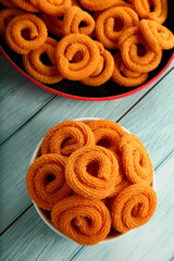 Crispy fried homemade muruku,murukku, chakli, famous Indian snack food recipes.