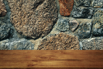 The background is blank wooden boards and a textured stone wall with lighting and vignetting.
