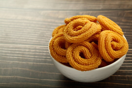 Vegan snack foods- homemade delicious and spicy chakli, murukku, muruku  from Indian cuisine.