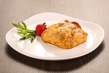 Sweet puff pastry served strawberry