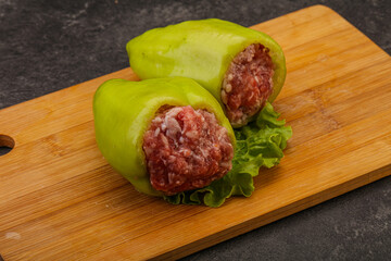 Raw stuffed pepper for cooking