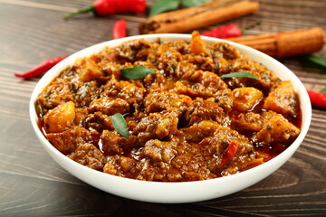 Bowl of delicious and spicy beef  curry roast .Indian cooking recipes.,