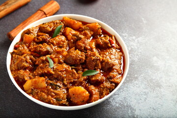 Bowl delicious Indian mutton, lamb curry, roast cooked with exotic spices.