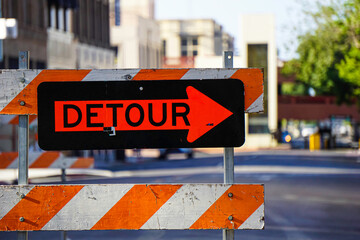 Detour sign on roadwork construction site