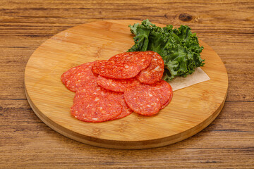 Italian spycy pepperoni sausage slices
