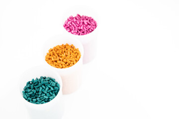 Plastic granules close up for holding,Colorful Plastic granules with white background.