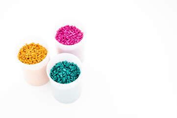 Plastic granules close up for holding,Colorful Plastic granules with white background.