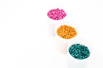 Plastic granules close up for holding,Colorful Plastic granules with white background.