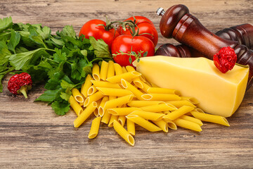 Raw penne rigate for cooking