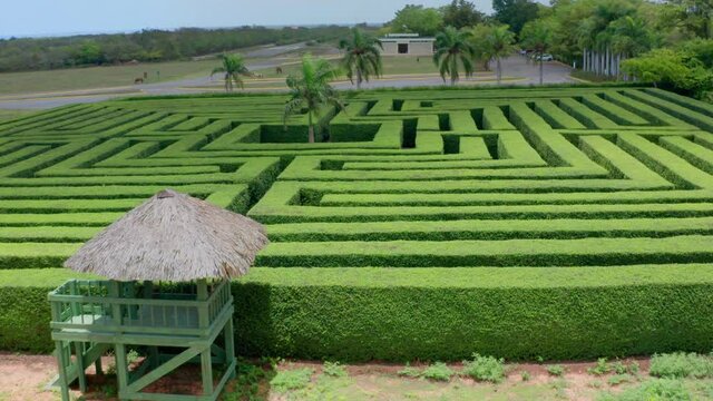 Aerial forward over green labyrinth 