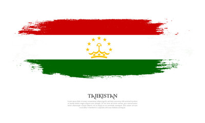 Tajikistan flag brush concept. Flag of Tajikistan grunge style banner background