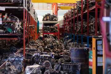 Automotive spare parts, engine on shelf pallet in storage warehouse or garage