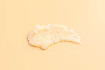 Sample of body scrub on color background
