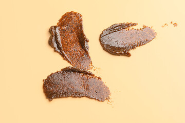 Samples of body scrub on color background