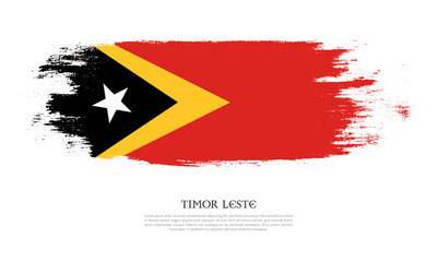 Timor Leste flag brush concept. Flag of Timor Leste grunge style banner background