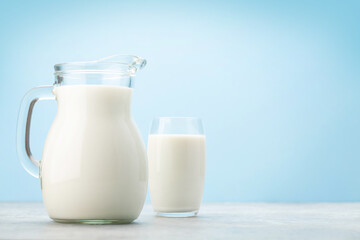 Obraz na płótnie Canvas Milk jug and glass