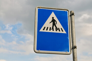 Pedestrian crossing street sign in Switzerland