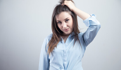 young woman hand in hair