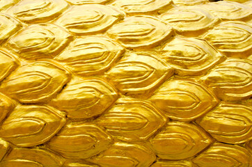 Naga scales, cement, gold colored cement