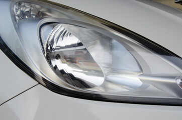White car right-hand headlight