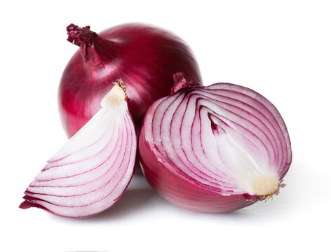 whole and sliced purple onion with pieces isolated on white background