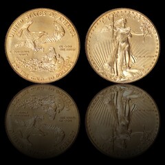 Gold coins of the United States of America isolated on a black background	